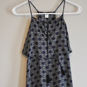 Geometric patterned top with tassels